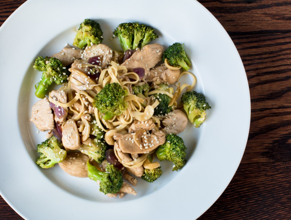 Broccoli, chicken, and cashews stir-fry in teriyaki sauce and linguini-9679