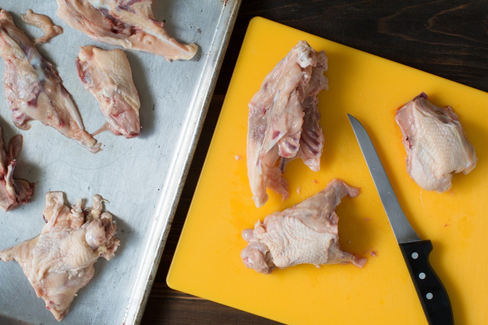 Broth bones being prepped for roasting for chicken stock hr-8946