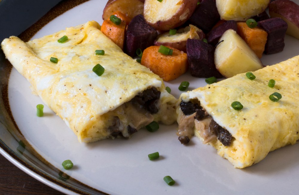 Chicken neck meat, morel, and cheddar cheese omelet with duck fat roasted mixed potatoes hr-9846-2