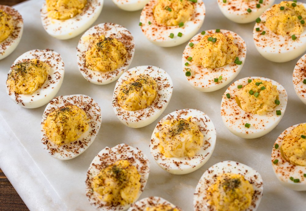 Deviled eggs with Gruyere, dark chocolate, and shiso powder hr-9603