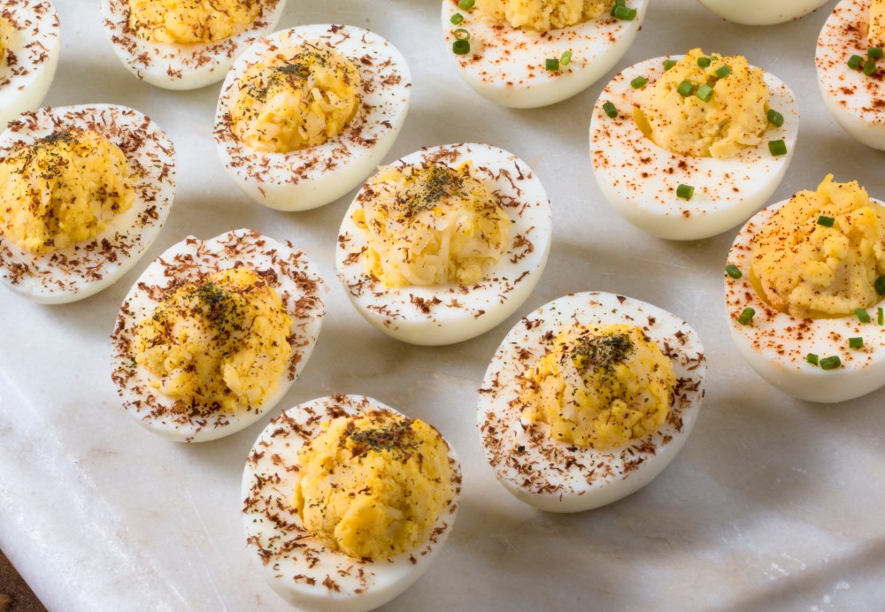 Deviled eggs with Gruyere, dark chocolate, and shiso powder hr-9613