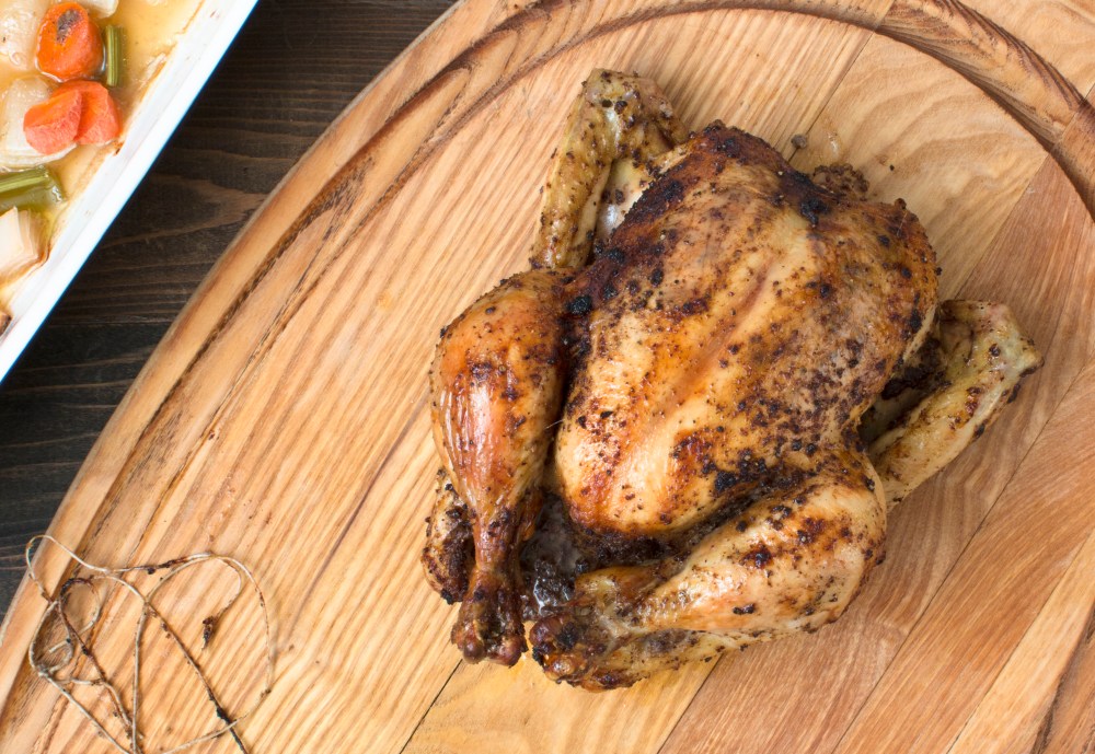 Dried lemon and pepper roast chicken on the cutting board hr-9244