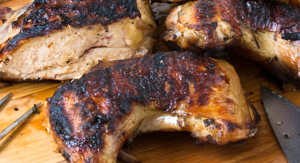 Grilled 2 butterfly chicken on the cutting board hr-9343