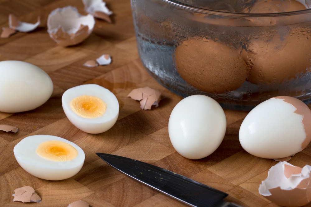 Prep for deviled eggs with Gruyere, dark chocolate, and shiso powder hr-9555